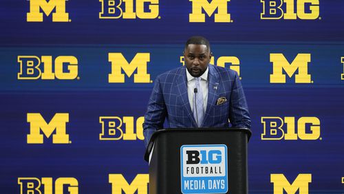 FILE - Michigan head coach Sherrone Moore speaks during an NCAA college football news conference at the Big Ten Conference media days at Lucas Oil Stadium, July 25, 2024, in Indianapolis. (AP Photo/Darron Cummings, File)