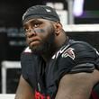 Atlanta Falcons defensive tackle Zion Logue reacts on the bench during their exhibition season game against the Jacksonville Jaguars at Mercedes-Benz Stadium, on Friday, Aug. 23, 2024, in Atlanta.  (Jason Getz / AJC)