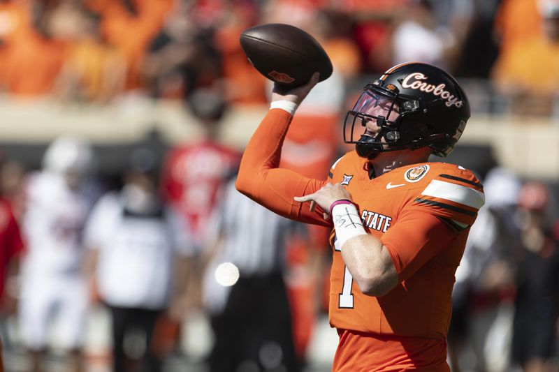 Oklahoma State quarterback Alan Bowman (7) passes the ball in the first half of an NCAA college football game against Utah Saturday, Sept. 21, 2024, in Stillwater, Okla. (AP Photo/Mitch Alcala)