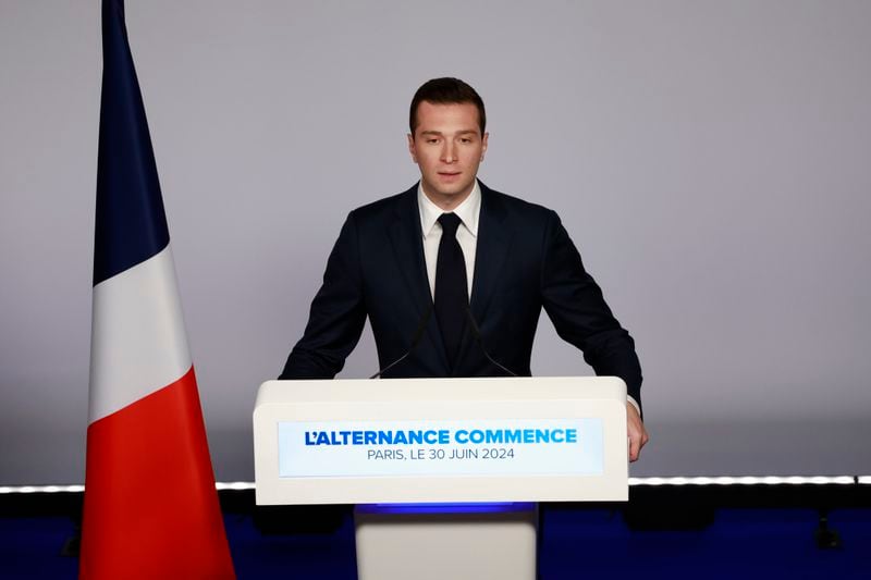 FILE - Far-right National Rally party president Jordan Bardella delivers his speech after the first round vote of the legislative election, Sunday, June 30, 2024 in Paris. After France’s far-right National Rally surged into the lead in the first round of legislative elections, some European neighbors are warily eyeing the latest country on the continent to veer to the right. (AP Photo/Aurelien Morissard, File)