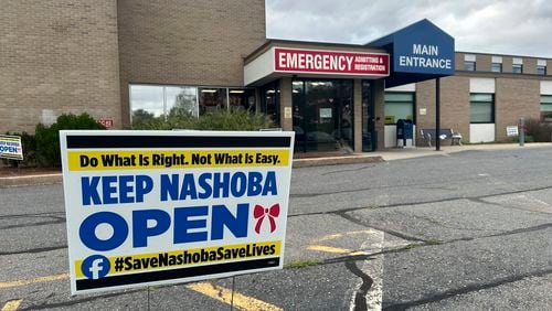 A sign pushing to keep the hospital open stands outside Nashoba Valley Medical Center in Ayer, Mass., Tuesday, Aug. 20, 2024. (AP Photo/Nick Perry)