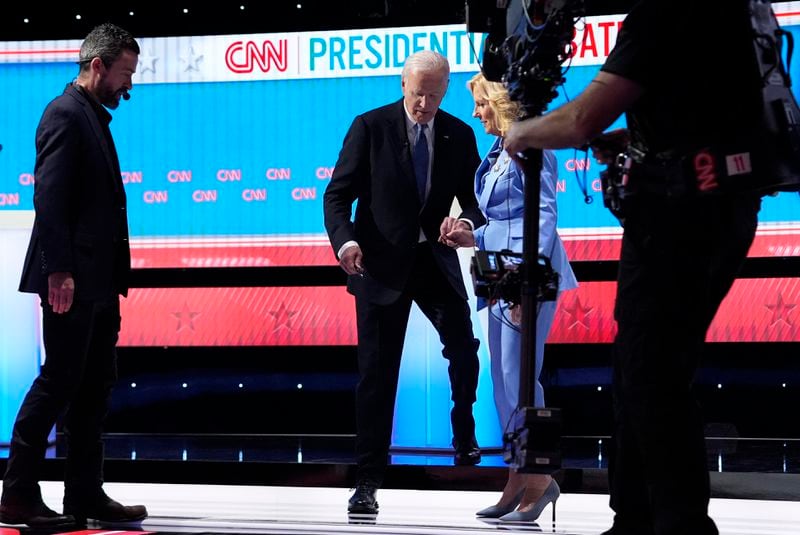 FILE - President Joe Biden, from second left, and first lady Jill Biden, walk off stage at the endof a presidential debate with Republican presidential candidate former President Donald Trump June 27, 2024, in Atlanta. (AP Photo/Gerald Herbert, File)