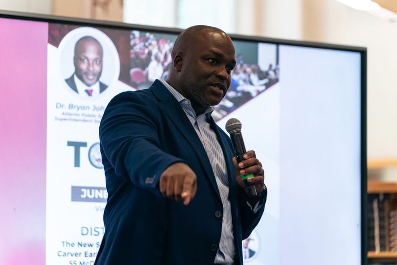 Bryan Johnson, the sole finalist for Atlanta Public Schools superintendent, speaks to members of the Carver New Schools community in Atlanta on Tuesday, June 25, 2024. He served as superintendent of Hamilton County Schools in Chattanooga, Tenn. (Seeger Gray/AJC)