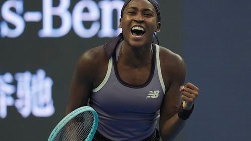 Coco Gauff of the United States celebrates after defeating Paula Badosa of Spain in a women's singles semi-final match for the China Open tennis tournament held at the National Tennis Center in Beijing, Saturday, Oct. 5, 2024. (AP Photo/Ng Han Guan)