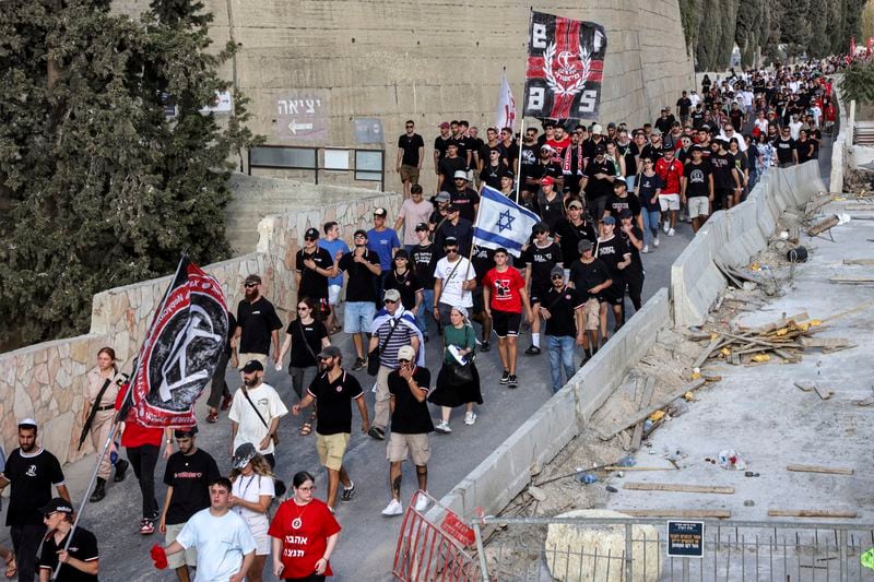 Mourners attend the funeral of Israeli-American hostage Hersh Goldberg-Polin, who was killed in Hamas captivity in the Gaza Strip, in Jerusalem, Monday, Sept. 2, 2024. (Gil Cohen-Magen/Pool via AP)