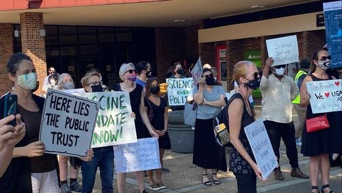 University of Georgia faculty members hold a rally on the Athens campus on Sept. 14, 2021, for additional measures to prevent the spread of COVID-19, such as mask mandates. (Eric Stirgus / eric.stirgus@ajc.com)