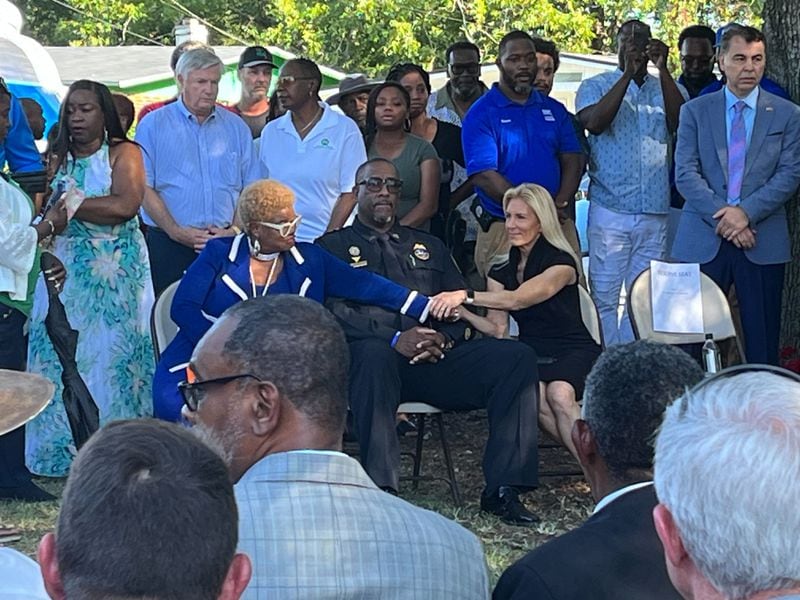 Councilwoman Ju’Coby Pittman touches the hand of Jacksonville Mayor Donna Deegan at the vigil on Sunday, August 27, 2023.