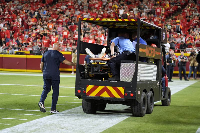 Chicago Bears defensive back Douglas Coleman III is taken off the field on a cart after being injured during the second half of an NFL preseason football game against the Kansas City Chiefs Thursday, Aug. 22, 2024, in Kansas City, Mo. (AP Photo/Charlie Riedel)