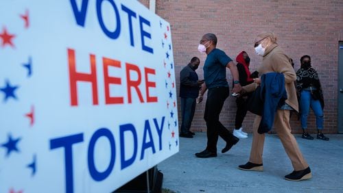 Dekalb County residents vote early at Berean Christian Church in Stone Mountain on Nov. 29, 2022.   (Arvin Temkar / arvin.temkar@ajc.com)