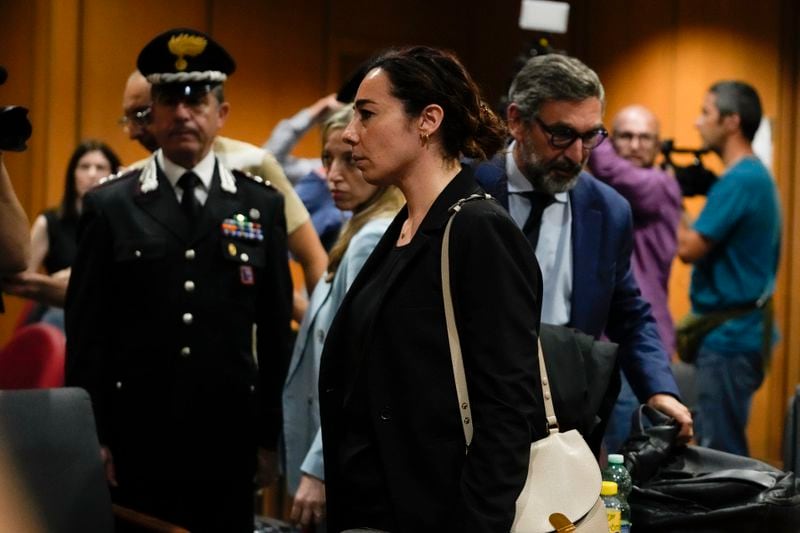 Rosa Maria Esilio, widow of Italian Carabinieri paramilitary police officer Mario Cerciello Rega, leaves after the reading of the judgment of the appeals trial for his murder, in Rome, Wednesday, July 3, 2024. (AP Photo/Alessandra Tarantino)