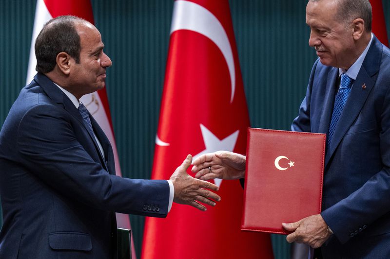 Turkish President Recep Tayyip Erdogan, right, shakes hands with Egyptian President Abdel Fattah el-Sissi during a bilateral signature agreements ceremony at the Presidential palace in Ankara, Wednesday, Sept. 4, 2024. (AP Photo/Francisco Seco)