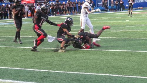 Callaway Cavaliers defensive back Jalin Shephard hauls in an interception on the final play of the GHSA Class 2A championship against the Fitzgerald Purple Hurricane on Tuesday, Dec. 29, 2020 at Georgia State's Center Parc Stadium.