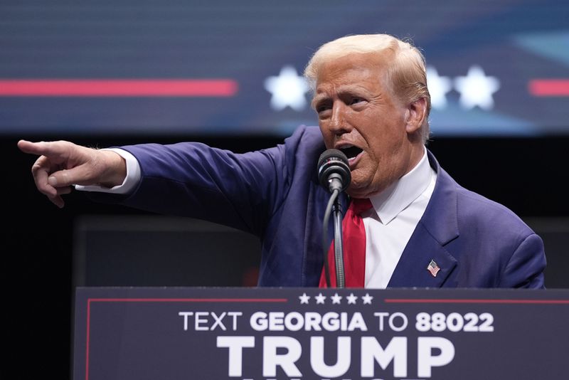 Republican presidential nominee former President Donald Trump speaks about the tax code and manufacturing at the Johnny Mercer Theatre Civic Center, Tuesday, Sept. 24, 2024, in Savannah, Ga. (AP Photo/Evan Vucci)