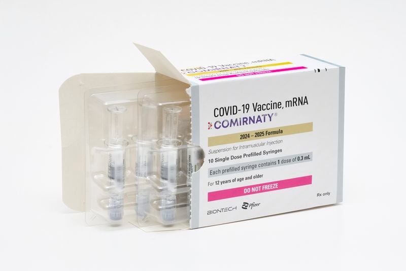 This photo provided by Pfizer in August 2024 shows a packaging for the company's updated COVID vaccine for ages 12 and up, approved by the U.S. Food and Drug Administration on Thursday, Aug. 22, 2024. (Steven Decroos/Pfizer via AP)