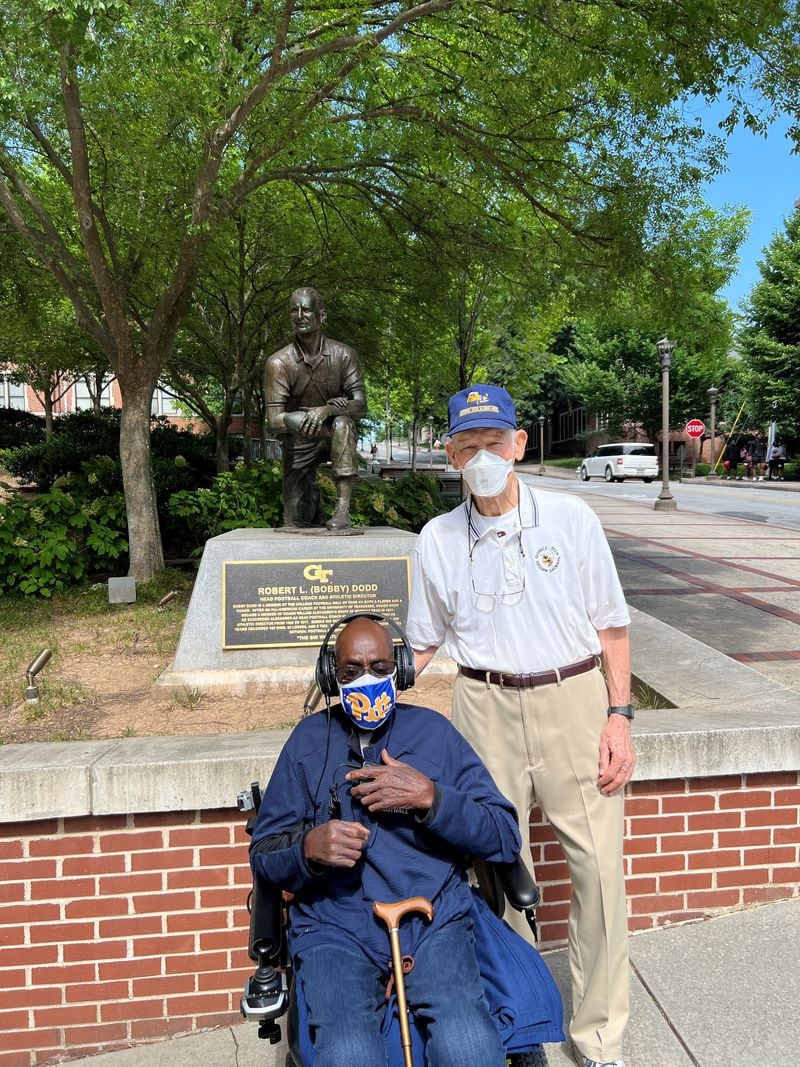 Bobby Grier (seated) and Wade Mitchell met in front of the Bobby Dodd statue on the Georgia Tech campus when Grier took a tour of the Tech campus in June. Grier played football at the University of Pittsburgh and Mitchell at Tech. Their teams met in the 1956 Sugar Bowl, a game known as a significant one in the history of segregation in the South. Grier played fullback for Pitt, and Mitchell was Tech's quarterback. The legendary Dodd was Tech’s coach from 1945-66. (Photo courtesy of Wright Mitchell)