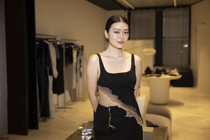 Singapore designer Grace Ling poses in her showroom where she displays her 3D printed designs on Friday, Sept. 13, 2024, in New York. Ling, a CFDA/Vogue Fashion Fund finalist, showcased her latest collection at New York Fashion Week. (Photo by Matt Licari/Invision/AP)