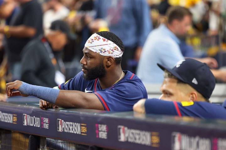 Atlanta Braves outfielder Michael Harris, left, reacts from the dugout with pitcher Joe Jiménez after losing to the San Diego Padres 5-4 in National League Division Series Wild Card Game Two at Petco Park in San Diego on Wednesday, Oct. 2, 2024. The Padres advance to the Division Series to face the Los Angeles Dodgers.  (Jason Getz / Jason.Getz@ajc.com)