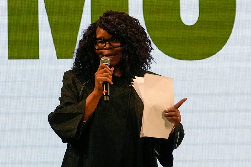 Afro Fashion Association founder Michelle Ngonmo talks during the second edition of the 'Black carpet awards' in Milan, Italy, Friday, Sept. 20, 2024. (AP Photo/Luca Bruno).