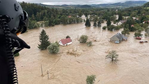 This handout photo provided by the Polish fire department, shows a flooded area near the Nysa Klodzka river in Nysa, Poland on Monday, Sept. 16, 2024. (KG PSP Photo via AP)