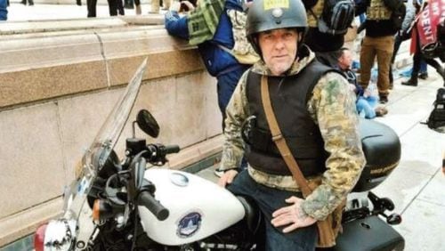 William Frederick Beals of Ringgold sits atop a U.S. Capitol Police motorcycle in a photo included as part of an FBI affidavit. Beals pleaded guilty in May to entering a restricted building and disorderly conduct in a restricted building as part of the Jan. 6, 2021, attack on the U.S. Capitol. (U.S. Department of Justice)