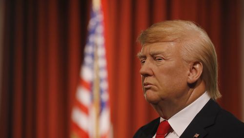 The wax figure of US President-elect Donald Trump debuted at Madame Tussauds in London Wednesday, Jan. 18, 2017, days ahead of the American's Presidential Inauguration in Washington. (AP Photo/Frank Augstein)