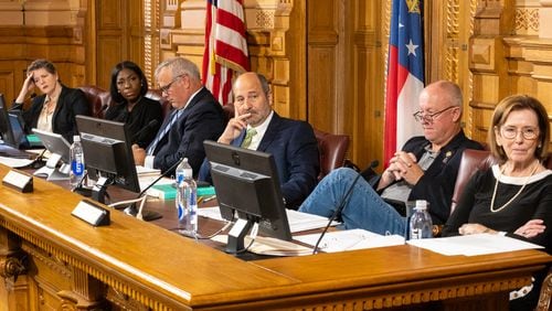 Board member Sara Tindall Ghazal, member Janelle King, executive director Mike Coan, chairman John Fervier, member Rick Jeffares and member Janice Johnston listen during the Georgia Election Board meeting in Atlanta on Monday, September 23, 2024. (Arvin Temkar / AJC)