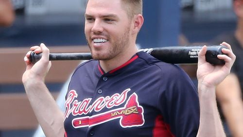 Freddie Freeman hasn’t had much smile about on the field lately, batting .189 (10-for-53) with one double, one homer and one RBI in his past 14 games before Sunday’s series finale against the Dodgers. (Curtis Compton/AJC file photo)