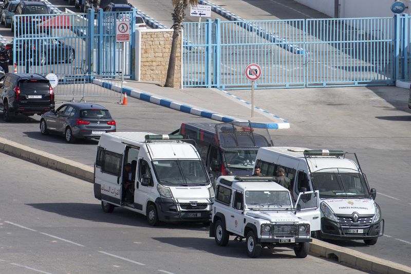 Moroccan security forces stand guard outside the border with the Spanish enclave of Ceuta, in Fnideq, Morocco, Monday, Sept. 16, 2024. (AP Photo)