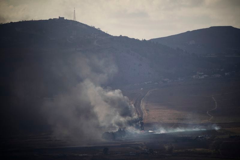 Smoke rises after an Israeli shelling on an area in Lebanon, seen from the Israel-annexed Golan Heights, next to the Israeli-Lebanese border, Monday, Sept. 16, 2024. (AP Photo/Leo Correa)