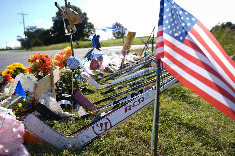 Shown is a makeshift memorial for NHL hockey player Johnny Gaudreau and his brother Matthew who were killed by a suspected drunken driver as they bicycled on a rural road, Sept. 5, 2024, in Oldmans Township , N.J., Thursday. (AP Photo/Matt Rourke)