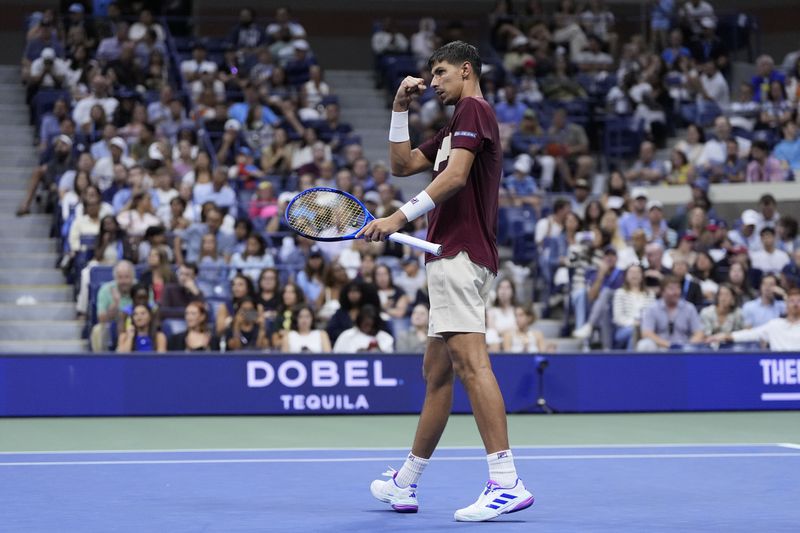 Alexei Popyrin, of Australia, reacts against Novak Djokovic, of Serbia, during a third round match of the U.S. Open tennis championships, Friday, Aug. 30, 2024, in New York. (AP Photo/Julia Nikhinson)