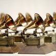 FILE - Grammy Awards are displayed at the Grammy Museum Experience at Prudential Center in Newark, N.J. on Oct. 10, 2017. (AP Photo/Julio Cortez, File)