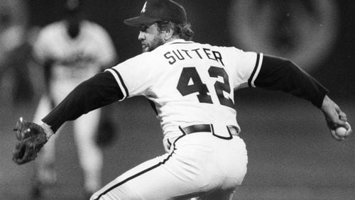 Braves reliever Bruce Sutter throws in the ninth inning April 5, 1988, the first of the Braves’ 10 consecutive losses to begin that season. (William Berry / AJC file)