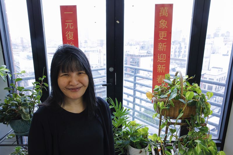 Beatrice Chen, executive director of Immigrant Social Services, poses for a photo at the social meeting room of the Senior Living Chung Pak complex, Thursday, Aug. 8, 2024, in New York. (AP Photo/Kena Betancur)