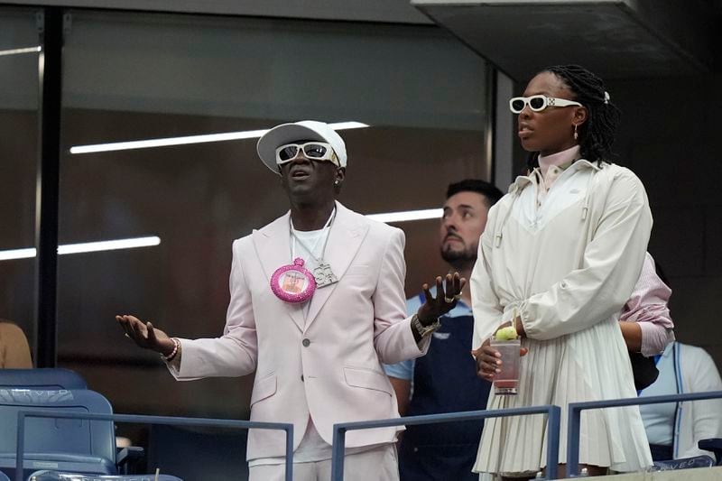 Flavor Flav arrives for the women's singles final of the U.S. Open tennis championships between Aryna Sabalenka, of Belarus, and Jessica Pegula, of the United States, Saturday, Sept. 7, 2024, in New York. (AP Photo/Frank Franklin II)