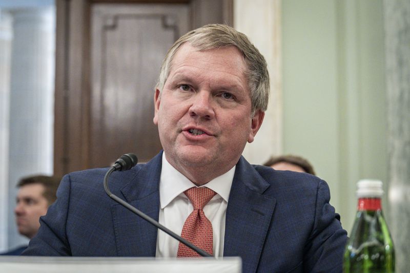 
                        Alan Shaw, president and CEO, Norfolk Southern Corporation, testifies during a Senate Commerce Committee hearing in Washington on improving rail safety in the wake of the Norfolk Southern train derailment and chemical release in East Palestine, on Wed., March 22, 2023. (Pete Marovich/The New York Times)
                      