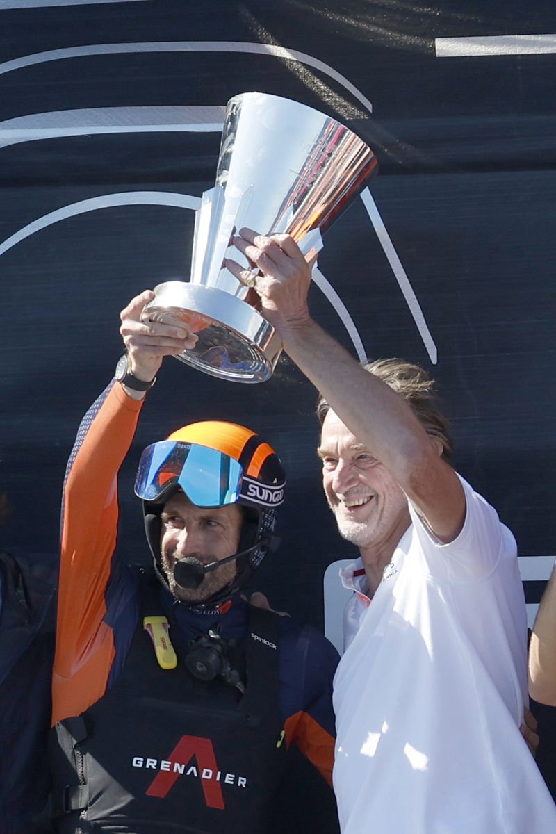 INEOS Britannia Chairman Jim Ratcliffe, right, and team skipper Ben Ainslie crew celebrate their team victory against the Luna Rosa Prada Pirelli's sailing team during the Louis Vuitton Cup Final Day 7 at the Barcelona's coast, Spain, Friday, Oct. 4, 2024. (AP Photo/Joan Monfort)