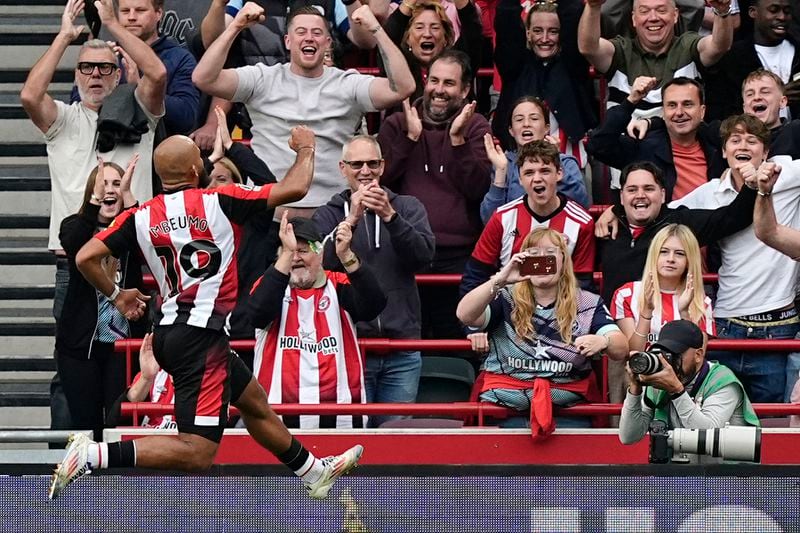 Brentford's Bryan Mbeumo celebrates scoring during the English Premier League soccer match between Brentford and Southampton at the Gtech Community Stadium, London, Saturday Aug. 31, 2024. (Aaron Chown/PA via AP)