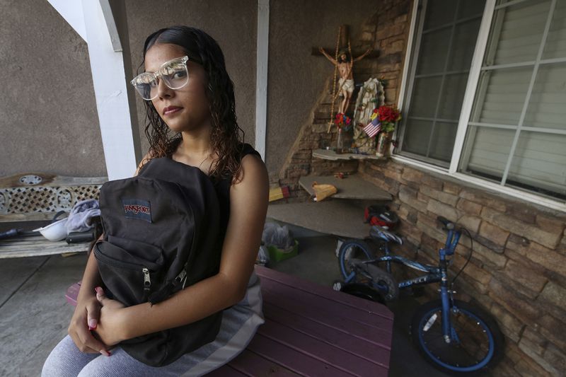 Melinda Gonzalez, 14, has benefitted from a program at Fort Miller Middle School to reduce chronic absenteeism in Fresno, Calif., Wednesday, Aug. 14, 2024. (AP Photo/Gary Kazanjian)