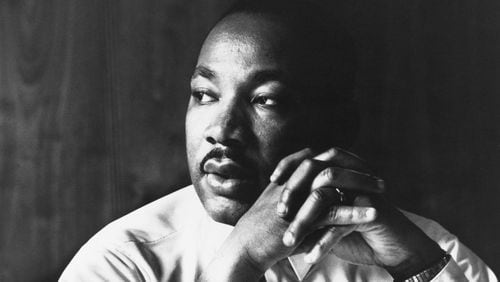 Martin Luther King Jr. listens to other staff members of SCLC during a meeting at an Atlanta restaurant. One of King’s foremost biographers has published new research that alleges King had sexual relations with at least 40 women, from prostitutes to people within his inner circle.