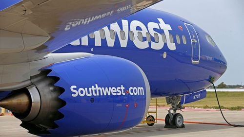 An employee of Southwest Airlines was hospitalized after being struck by a passenger at Dallas Love Field Airport.