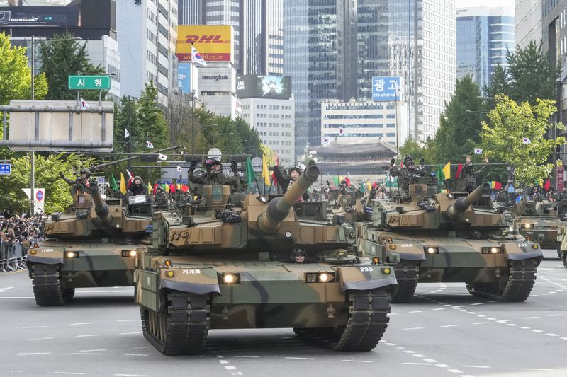 South Korean army's K2 tanks take part in a parade during the 76th Armed Forces Day ceremony in Seoul, South Korea, Tuesday, Oct. 1, 2024. (AP Photo/Ahn Young-joon)