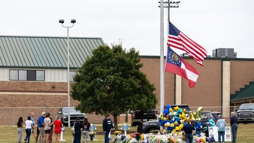 Mourners gather at Apalachee High School on Sept. 6, 2024, in Winder, Georgia. (Arvin Temkar/The Atlanta Journal-Constitution/TNS)