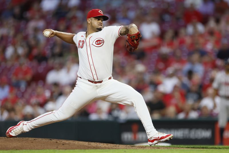 Cincinnati Reds relief pitcher Fernando Cruz throws against the Atlanta Braves during the second inning of a baseball game, Tuesday, Sept. 17, 2024, in Cincinnati. (AP Photo/Jay LaPrete)