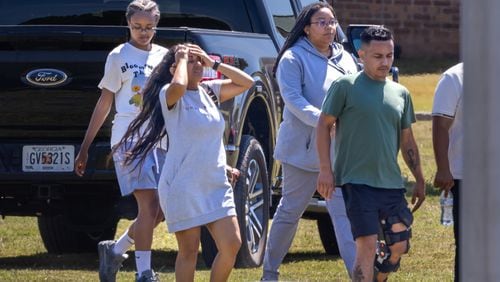 Four people were killed and nine others were taken to various hospitals after a shooting at Apalachee High School in Barrow County, the GBI said Wednesday afternoon, Sept. 4, 2024. One person was in custody, the state agency confirmed. (John Spink/AJC)