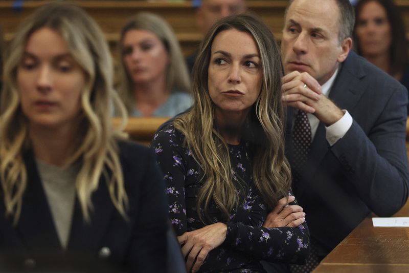 Karen Read listens during closing arguments during her trial at Norfolk Superior Court on Tuesday, June 25, 2024 in Dedham, Mass. Read is accused of killing her boyfriend Boston police Officer John O'Keefe, in 2022. (Nancy Lane/The Boston Herald via AP, Pool)