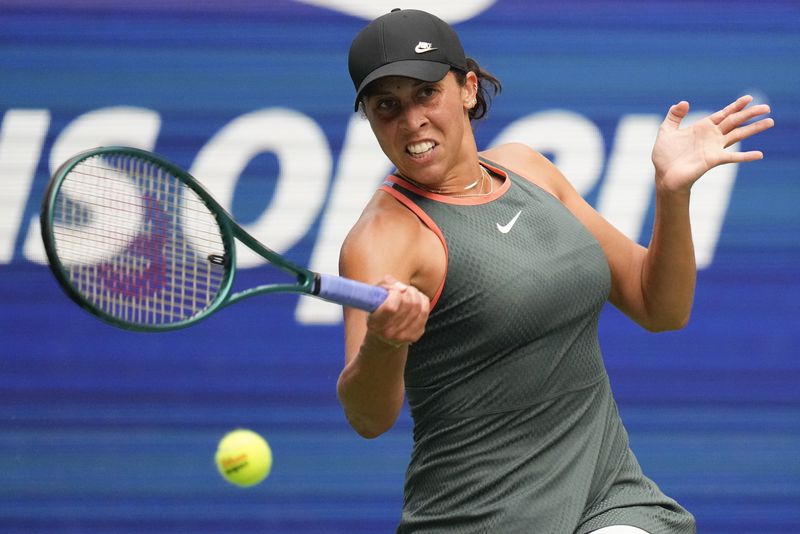 Madison Keys, of the United States, returns a shot to Katerina Siniakova, of the Czech Republic, during the first round of the U.S. Open tennis championships, Monday, Aug. 26, 2024, in New York. (AP Photo/Kirsty Wigglesworth)