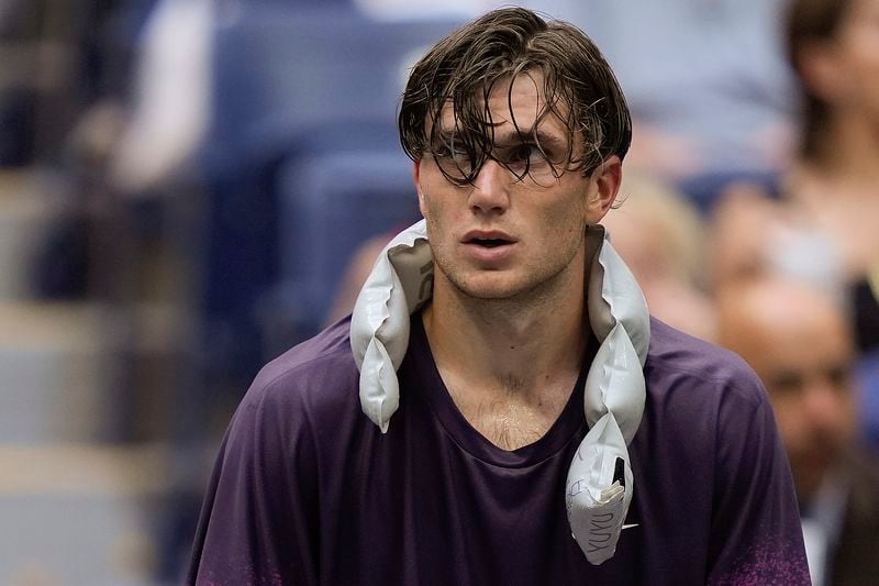 Jack Draper, of Great Britain, cools off during a break between games against Jannik Sinner, of Italy, during the men's singles semifinal of the U.S. Open tennis championships, Friday, Sept. 6, 2024, in New York. (AP Photo/Julia Nikhinson)