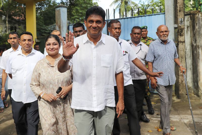 Sajith Premadasa, opposition leader and the presidential candidate of United People's Power or Samagi Jana Balawegaya party, gestures as he leaves a polling station after casting his vote, in Colombo, Sri Lanka, Saturday, Sep. 21, 2024. (AP Photo)