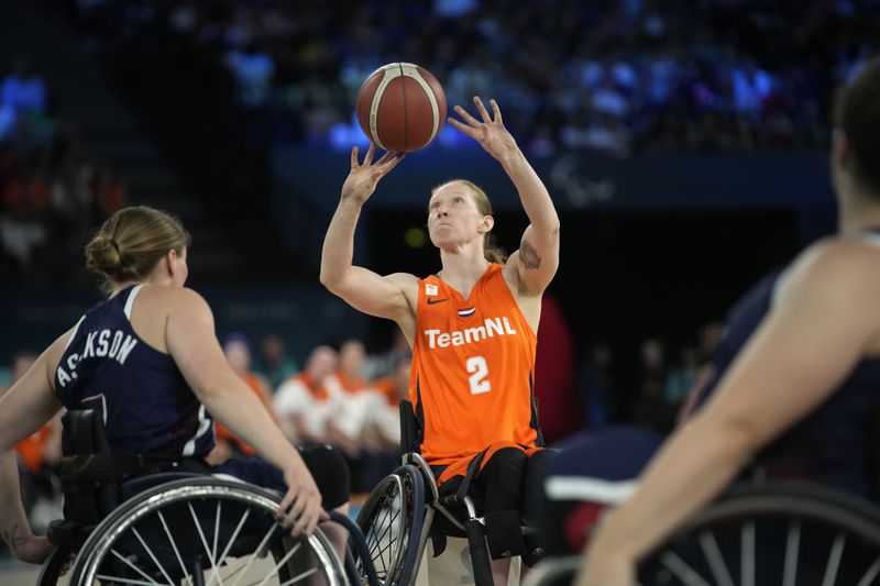 Netherlands' Ilse Arts in action during the gold medal match of the women's wheelchair basketball between Netherlands and United States, at the 2024 Paralympics, Sunday, Sept. 8, 2024, in Paris, France. (AP Photo/Christophe Ena)